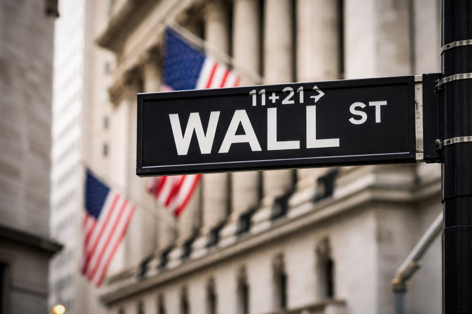 Dow ends 50 points higher as Nasdaq slides on inflation, chip selloff